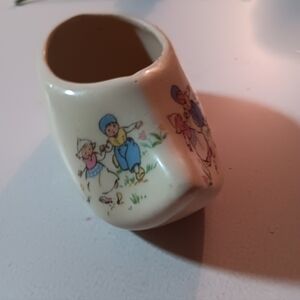 Dutch ceramic shoe. May be paint faded in some places